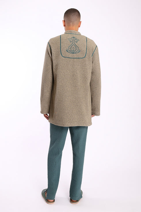 Jacket in faux fur with embroidery on the back